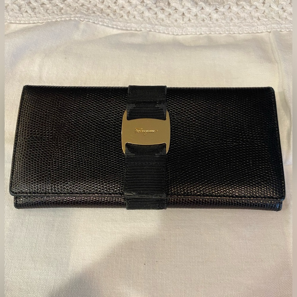 Salvatore Ferragamo black leather trifold wallet